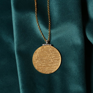 Round Necklace Depicting Egyptian Pyramids