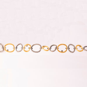 Asymmetrical Ring Design Bracelet